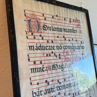 Feuille encadrée d'un antiphonaire, manuscrit enluminé en latin