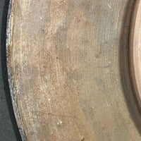 Assiette en terre cuite peinte du début du XXe siècle