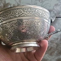 Tasse et sous tasse en argent massif