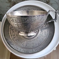 Tasse et sous tasse en argent massif