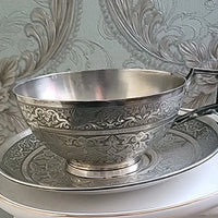 Tasse et sous tasse en argent massif