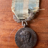 Médaille coloniale de l'état français en laiton