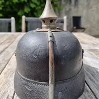 Casque à pointe modèle 1915 en cuir et métal gris