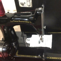 Machine à coudre singer 222K