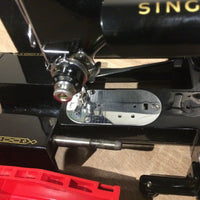 Machine à coudre singer 222K