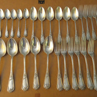 30 couverts argent massif minerve ; finements ouvragés monogrammés