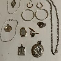 Lots de bijoux anciens en or 18 k et argent massif