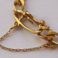 Belle gourmette en or 18 k