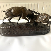 Sculpture en bronze combat de cerfs