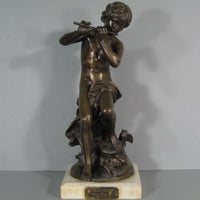 Sculpture en bronze joueur de flute