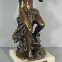 Sculpture en bronze joueur de flute