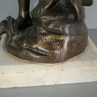 Sculpture en bronze joueur de flute