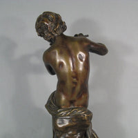 Sculpture en bronze joueur de flute