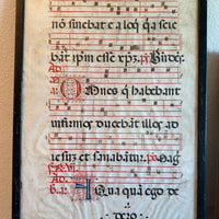 Feuille encadrée d'un antiphonaire, manuscrit enluminé en latin