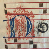Feuille encadrée d'un antiphonaire, manuscrit enluminé en latin