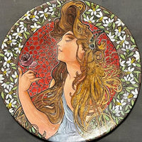 Assiette en terre cuite peinte du début du XXe siècle