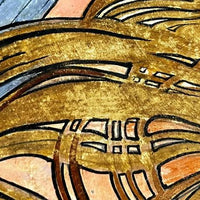 Assiette en terre cuite peinte du début du XXe siècle