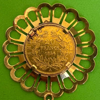 Pendentif monté sur pièce de 20 francs or Napoléon III 1854, entourage or