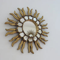 Ancien miroir soleil mural