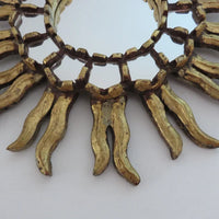 Ancien miroir soleil mural