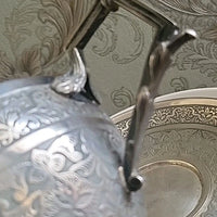 Tasse et sous tasse en argent massif