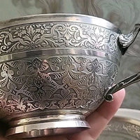 Tasse et sous tasse en argent massif