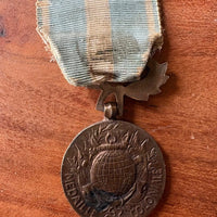 Médaille coloniale de l'état français en laiton