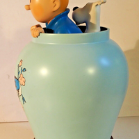 Figurine tintin dans la potiche