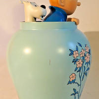 Figurine tintin dans la potiche