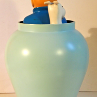 Figurine tintin dans la potiche