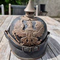Casque à pointe modèle 1915 en cuir et métal gris