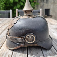 Casque à pointe modèle 1915 en cuir et métal gris