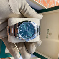 Montre de luxe Rolex Datejust 41 référence 126300 avec cadran vert prestigieux