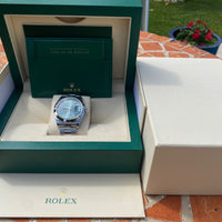 Montre de luxe Rolex Datejust 41 référence 126300 avec cadran vert prestigieux