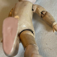 Antique petite poupée
