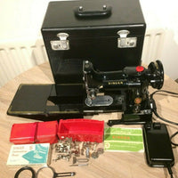 Machine à coudre singer 222K