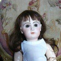 Poupée jumeau taille 9