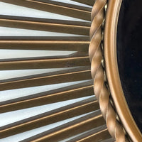 Miroir Soleil Chaty Vallauris en métal doré Années 1950-1960