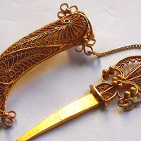 Superbe bijou ancien en or 18 k broche avec couteau et son étui