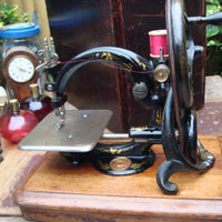 Machine à coudre ancienne et vintage wilcox & gibbs