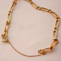 Belle gourmette en or 18 k