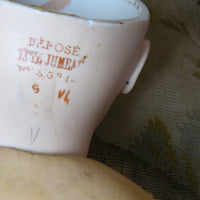 Poupée jumeau taille 9