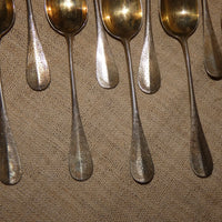 12 petites cuillères et pince à sucre anciennes en argent massif