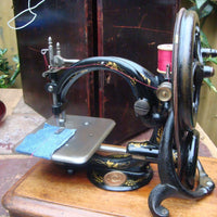 Machine à coudre ancienne et vintage wilcox & gibbs