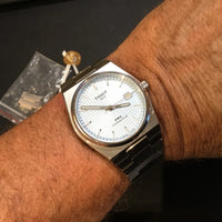 Montre Tissot PRX Powermatic 80 automatique cadran bleu Tiffany bracelet acier