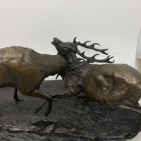 Sculpture en bronze combat de cerfs
