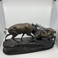Sculpture en bronze combat de cerfs
