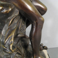 Sculpture en bronze joueur de flute