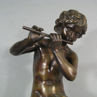 Sculpture en bronze joueur de flute